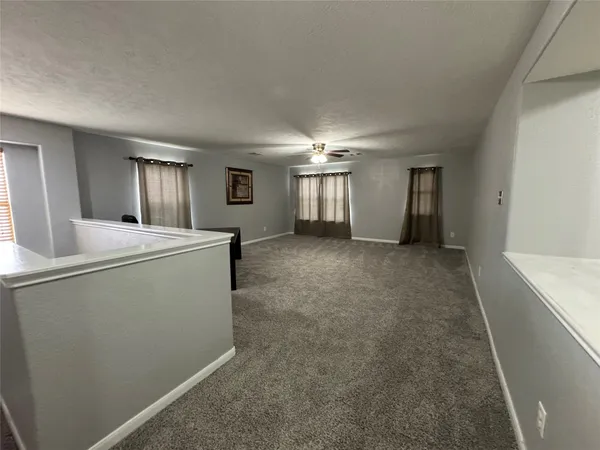 a view of hallway with washer and dryer