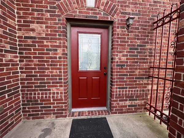 a front view of a house with a door