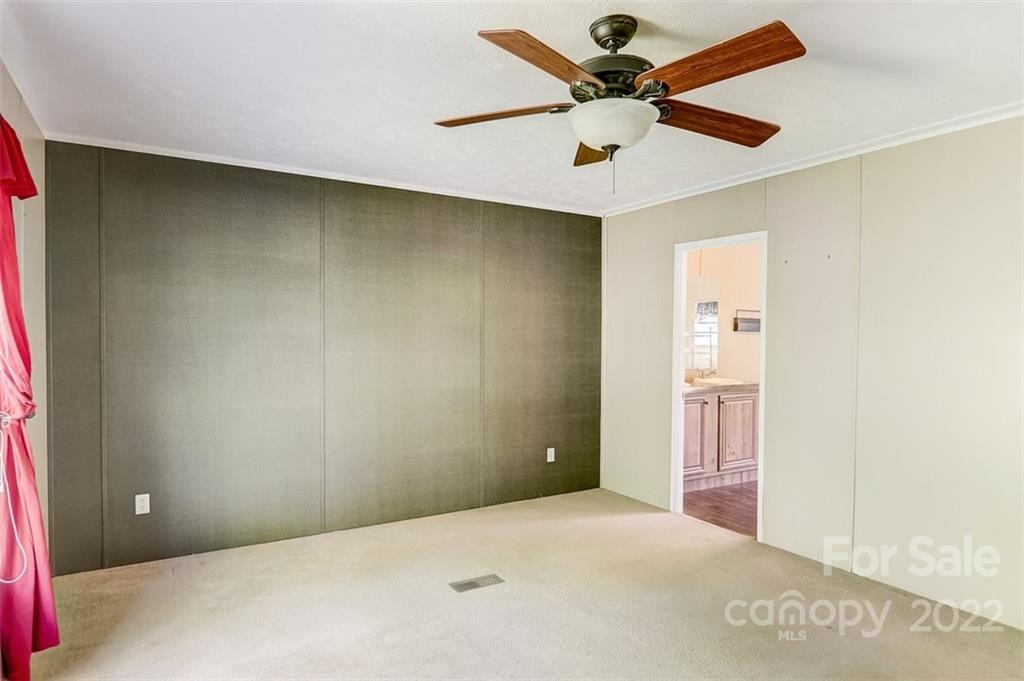 78 Alexander Road Alexander, NC 28701 - Photo 11 of 21 a view of a room with a ceiling fan