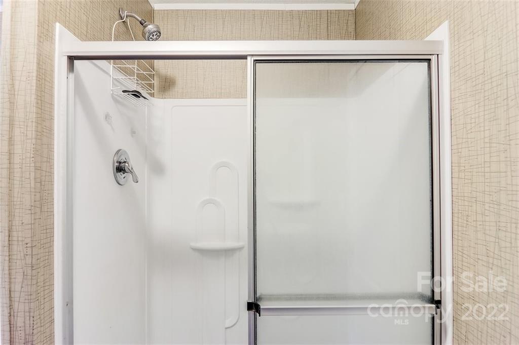 78 Alexander Road Alexander, NC 28701 - Photo 13 of 21 a bathroom with a shower