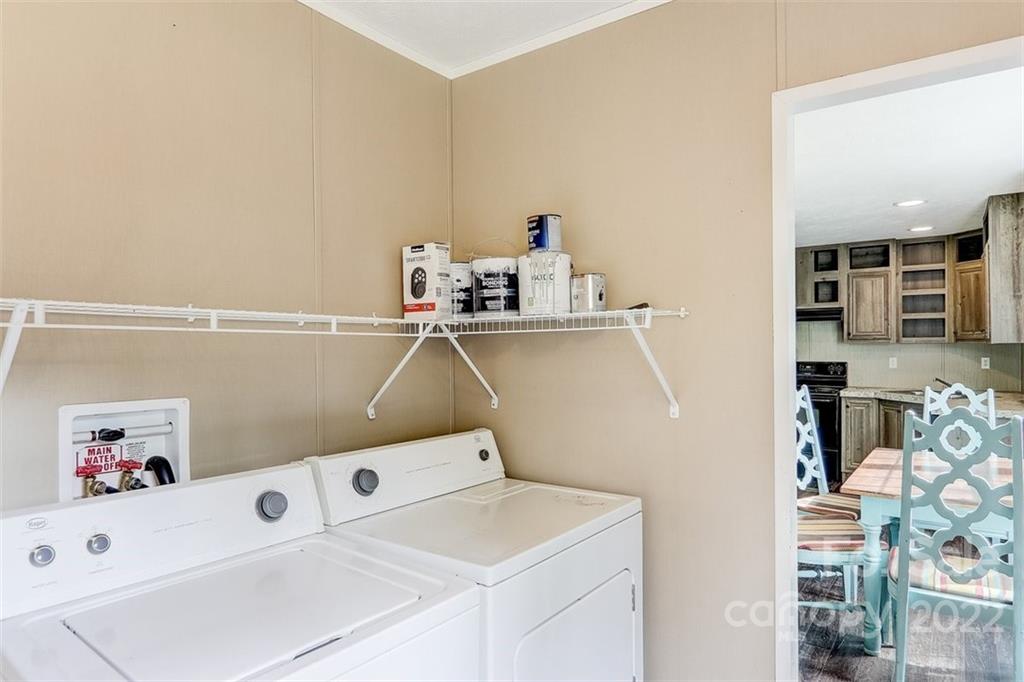 78 Alexander Road Alexander, NC 28701 - Photo 17 of 21 a utility room with dryer and washer