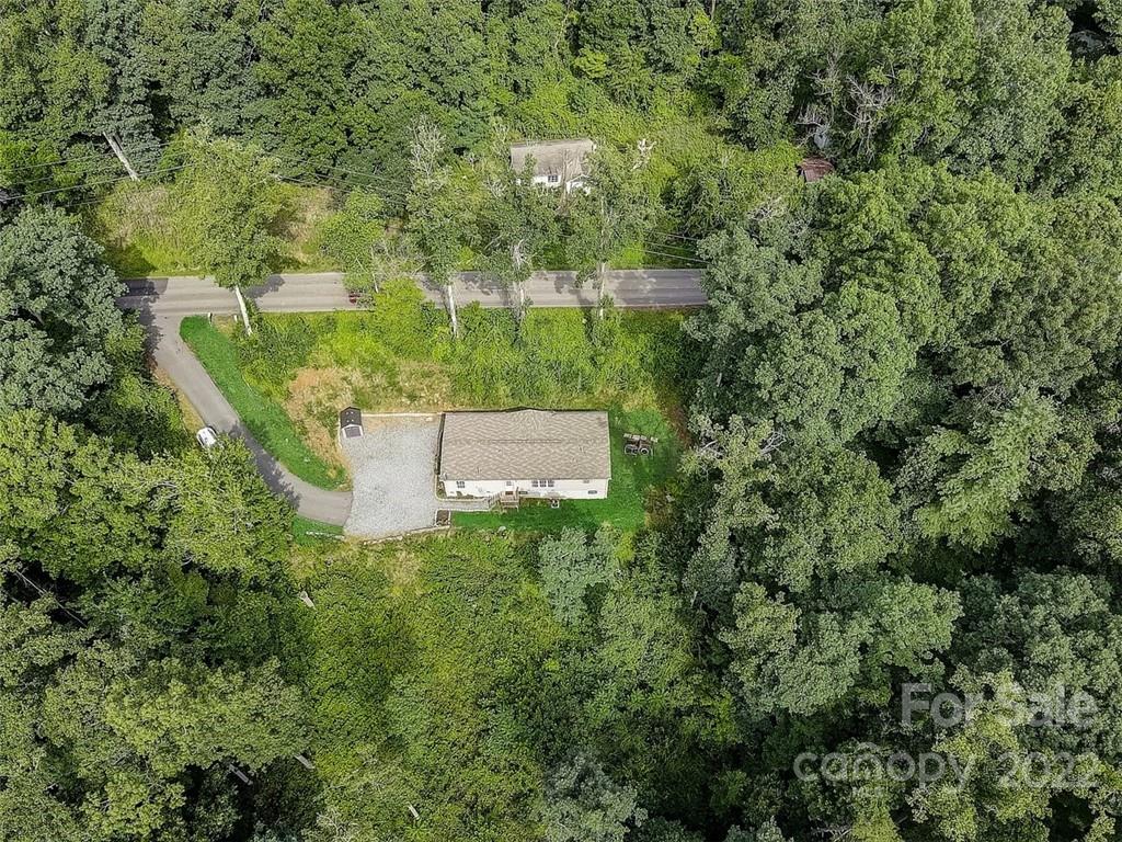 78 Alexander Road Alexander, NC 28701 - Photo 19 of 21 an aerial view of a house with a yard