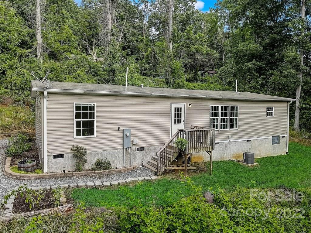 78 Alexander Road Alexander, NC 28701 - Photo 4 of 21 front view of a house with a yard