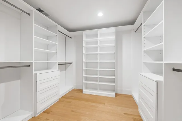 a view of an empty walk in closet