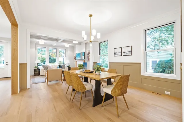 a view of a dining room with furniture window and outside view
