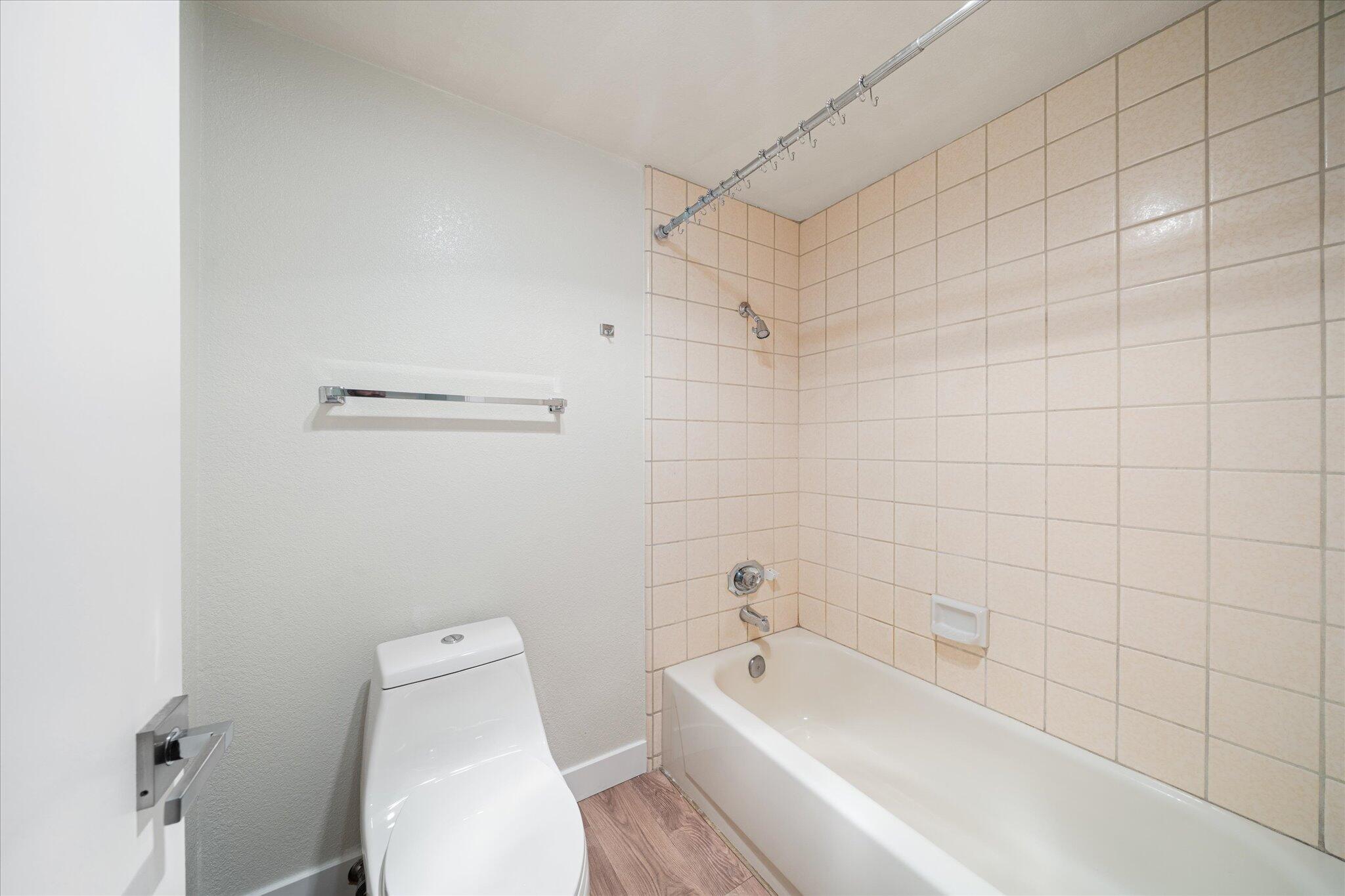 488 Ridgecrest Trail, Unit 132 Redding, CA 96003 - Photo 25 of 51 a bathroom with a toilet and bathtub