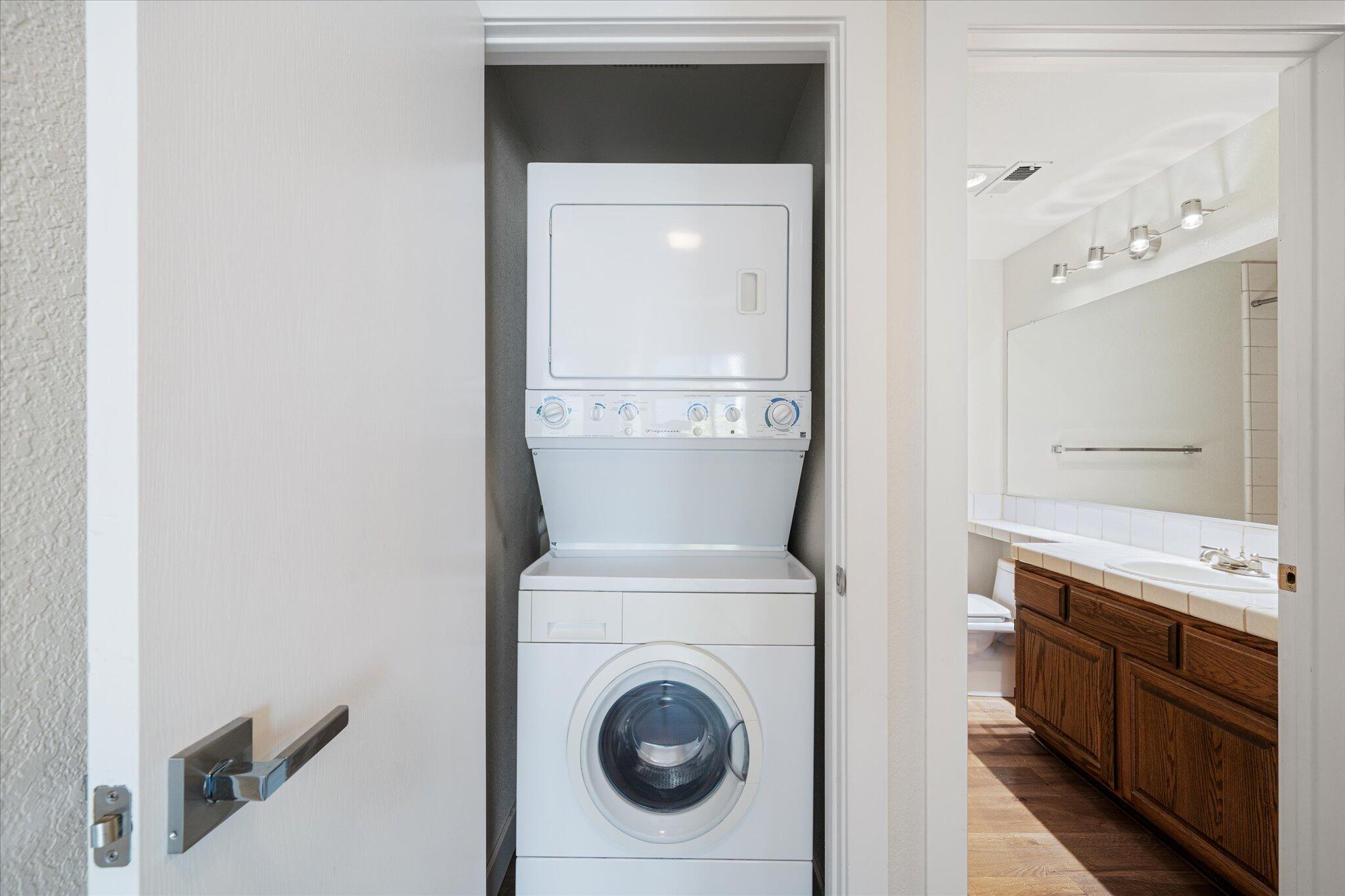 488 Ridgecrest Trail, Unit 132 Redding, CA 96003 - Photo 29 of 51 a bathroom with a sink a washer and dryer
