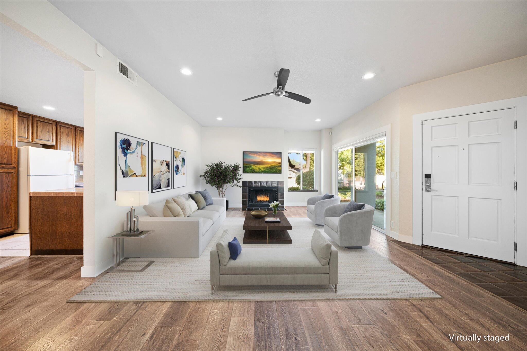 488 Ridgecrest Trail, Unit 132 Redding, CA 96003 - Photo 3 of 51 a living room with furniture and wooden floor