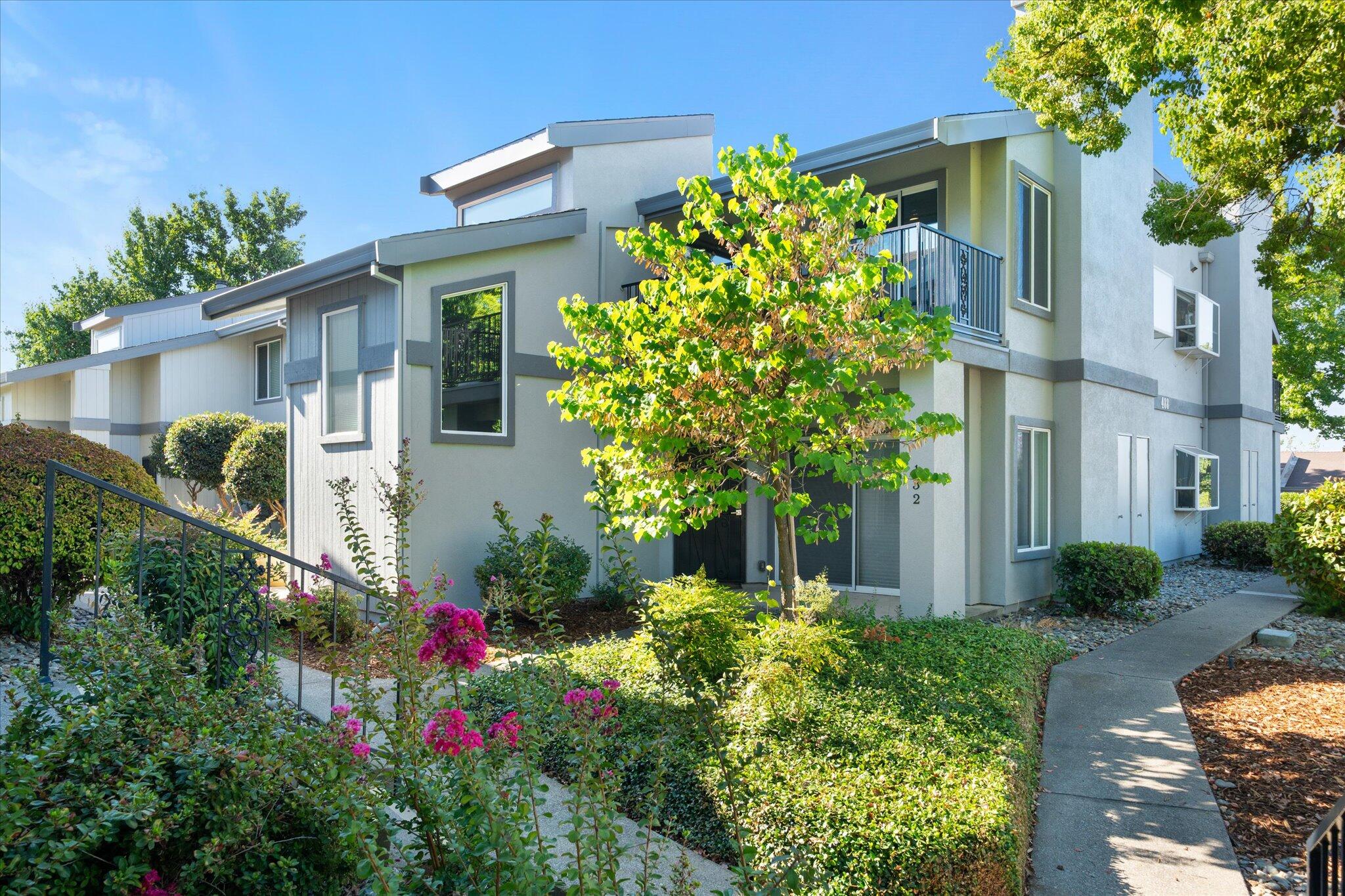 488 Ridgecrest Trail, Unit 132 Redding, CA 96003 - Photo 40 of 51 a view of a house with a flower garden