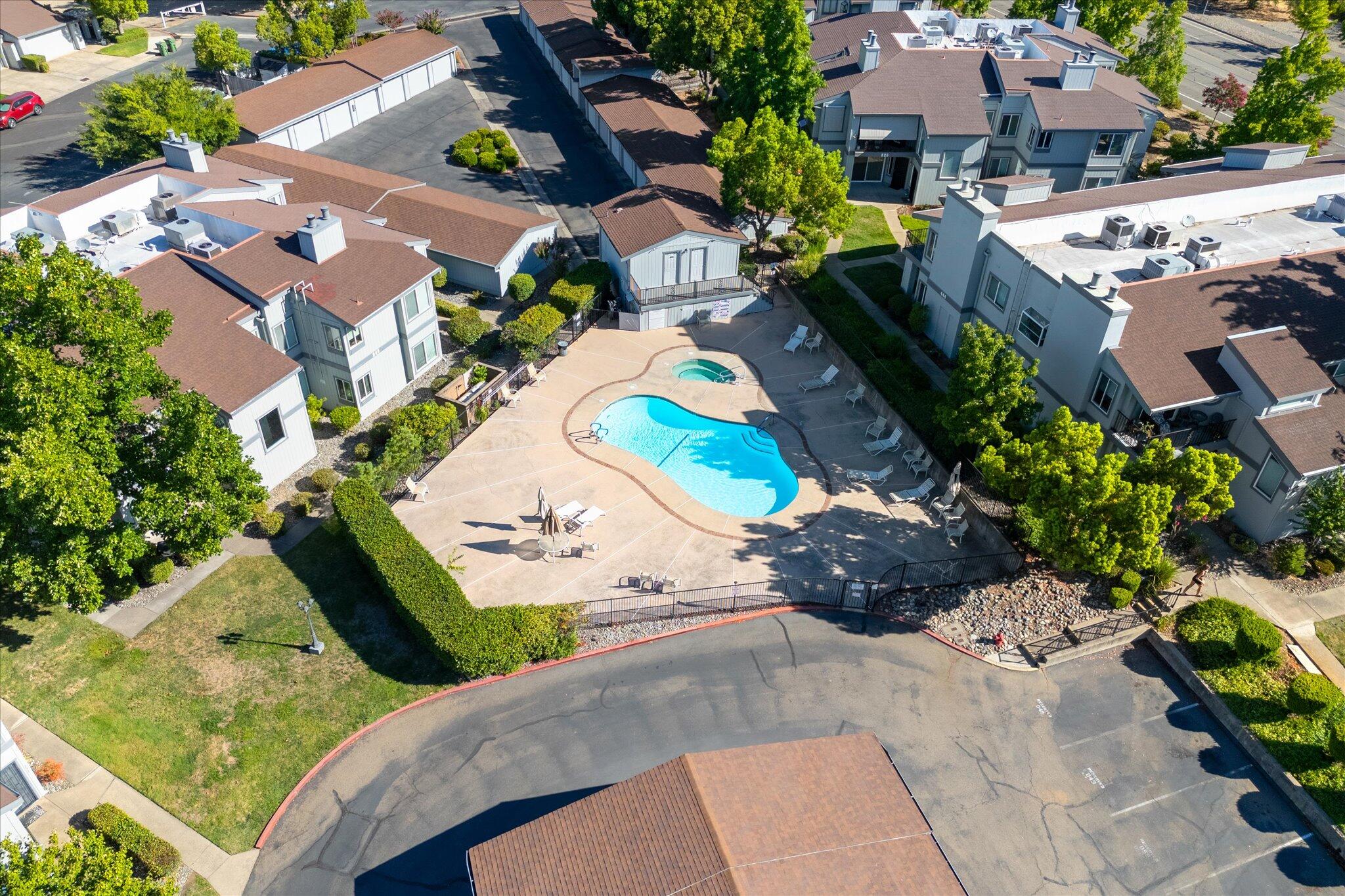 488 Ridgecrest Trail, Unit 132 Redding, CA 96003 - Photo 45 of 51 an aerial view of residential houses with outdoor space