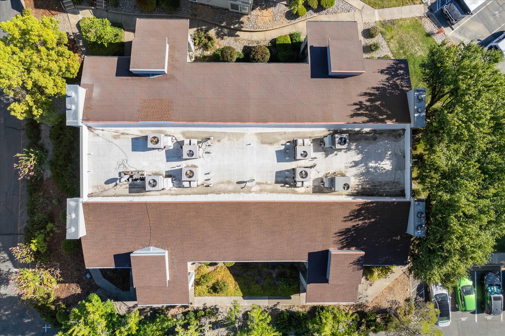 488 Ridgecrest Trail, Unit 132 Redding, CA 96003 - Photo 47 of 51 an aerial view of a house with a yard