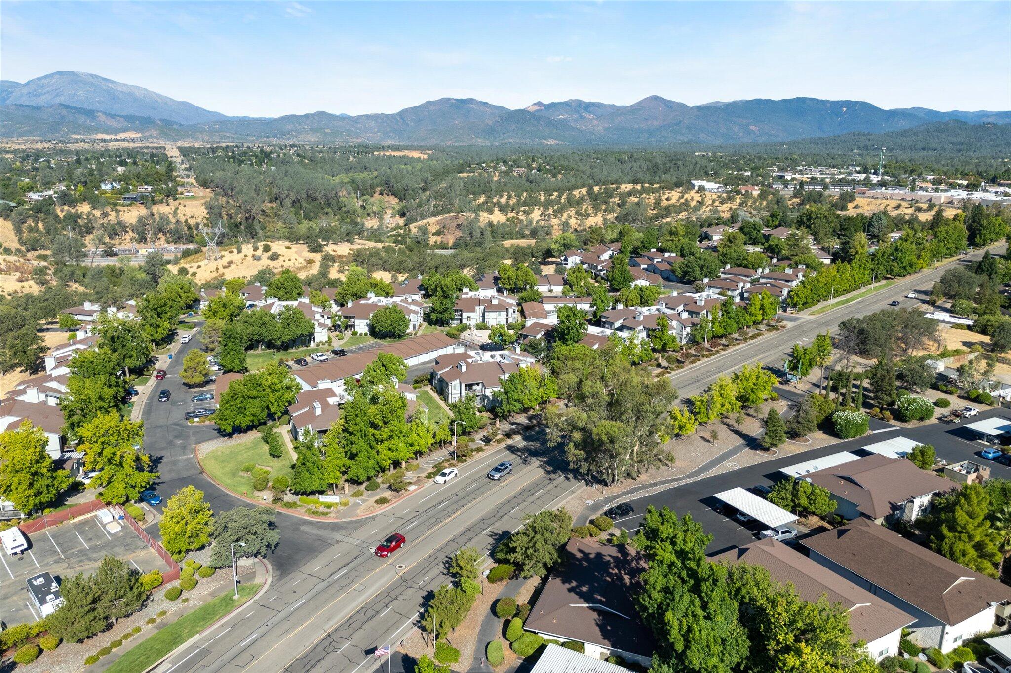 488 Ridgecrest Trail, Unit 132 Redding, CA 96003 - Photo 51 of 51 an aerial view of residential house with outdoor space and mountain view