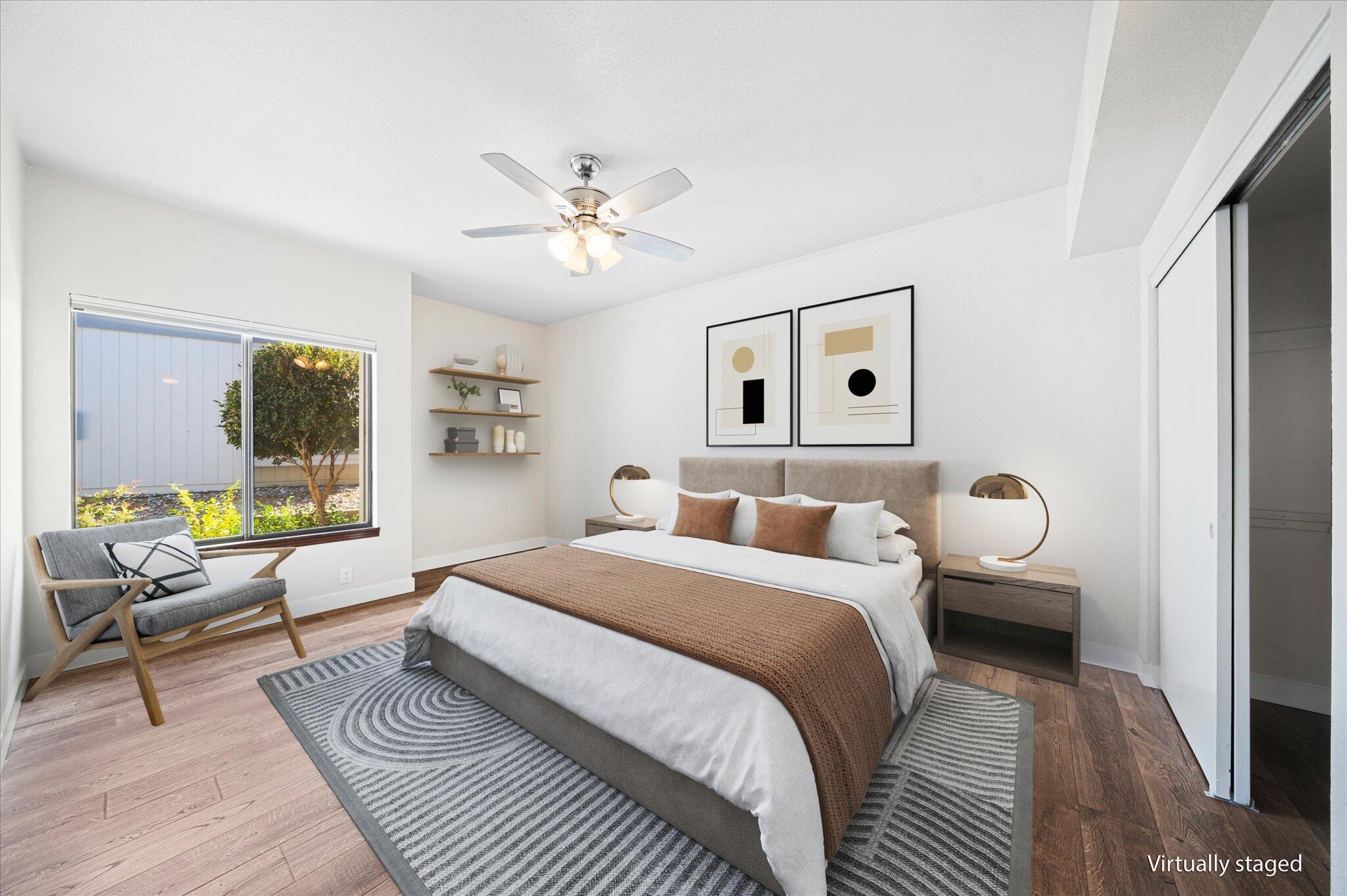 488 Ridgecrest Trail, Unit 132 Redding, CA 96003 - Photo 7 of 51 a bedroom with a bed wooden floor and window