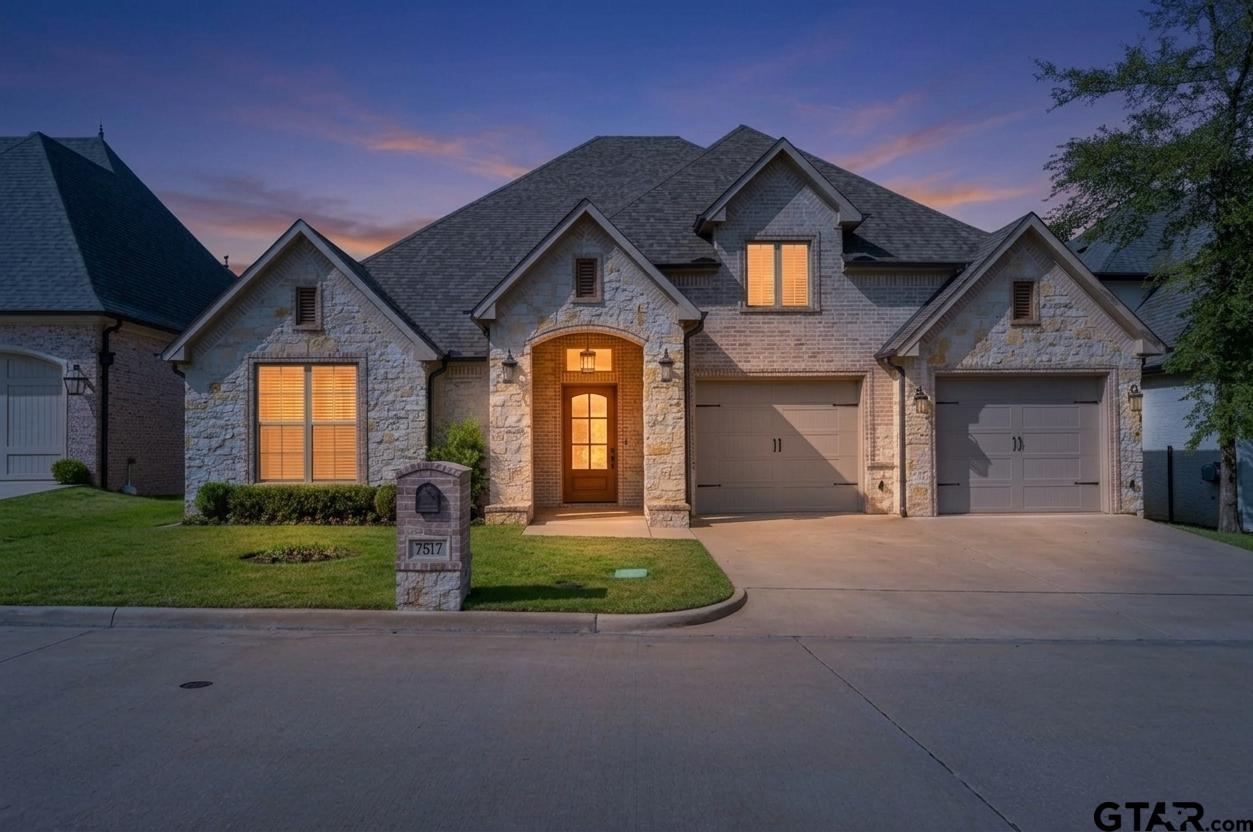 7517 Cross Gate Way Tyler, TX 75703 - Photo 2 of 47 a front view of a house with a yard