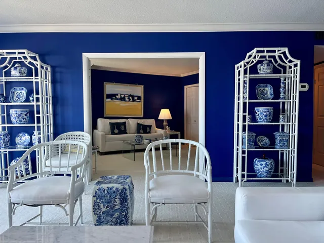 a kitchen with a sink a stove and cabinets