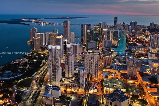 a view of swimming pool with outdoor seating