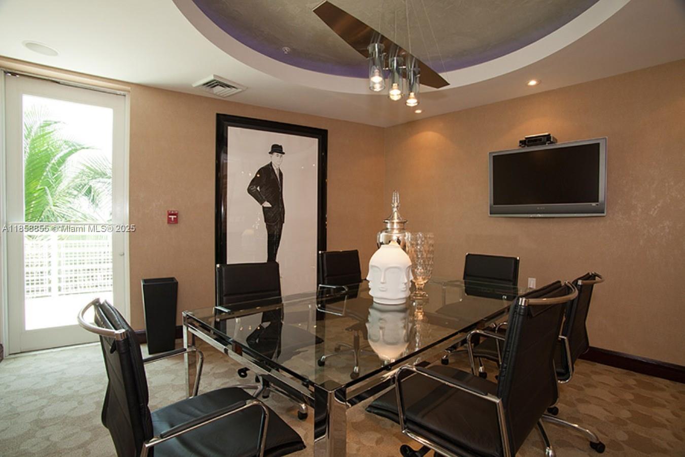 253 Northeast 2nd Street, Unit 3302 Miami, FL 33132 - Photo 24 of 27 a dining room with furniture and window