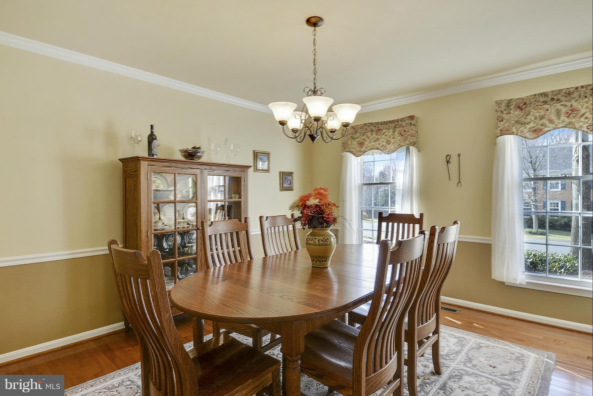 11952 Grey Squirrel Lane Reston, VA 20194 - Photo 14 of 30 a view of a dining room with furniture and window
