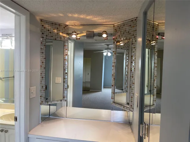 a view of gallery with windows