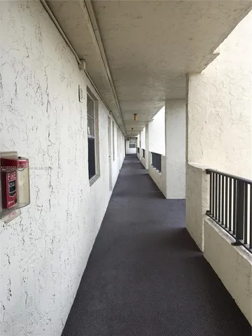 a view of a hallway with entryway