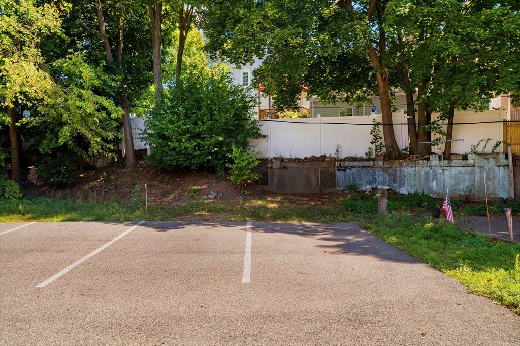 24 Goldsmith Street, Unit 24 Boston, MA 02130 - Photo 23 of 23 a view of a back yard
