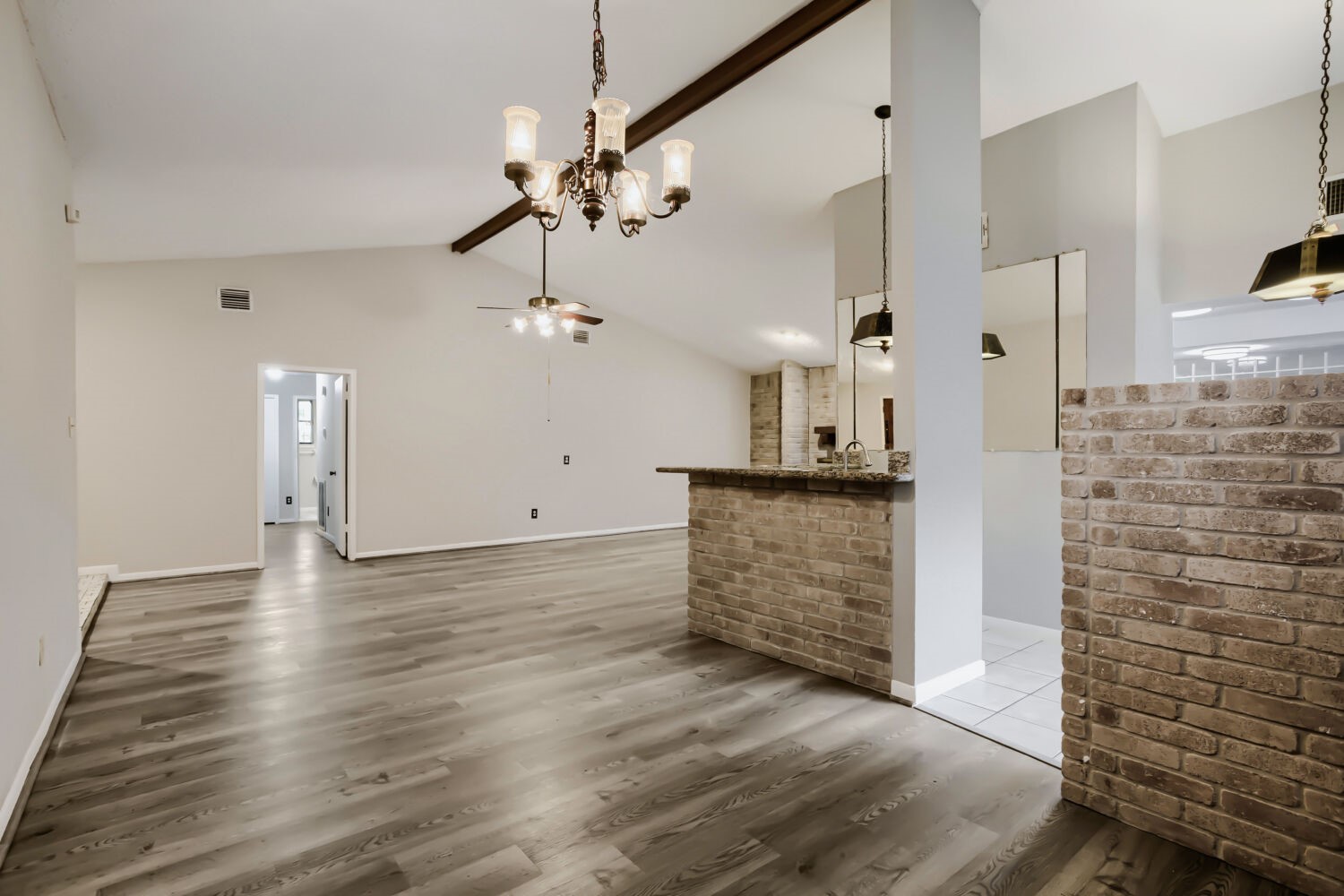 10103 Inwood Shadows Street Houston, TX 77088 - Photo 7 of 32 a view of a kitchen cabinets and wooden floor