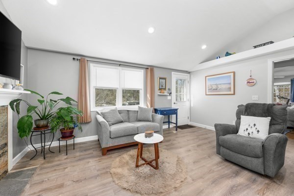 16 Hazelwood Road Dennis, MA 02660 - Photo 10 of 40 a living room with furniture and a flat screen tv