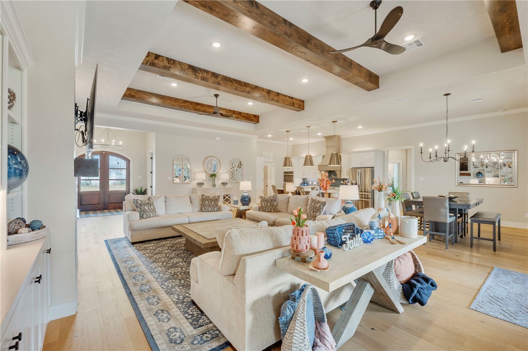 4804 Crystal Ridge Court College Station, TX 77845 - Photo 11 of 48 a living room with lots of furniture and kitchen view