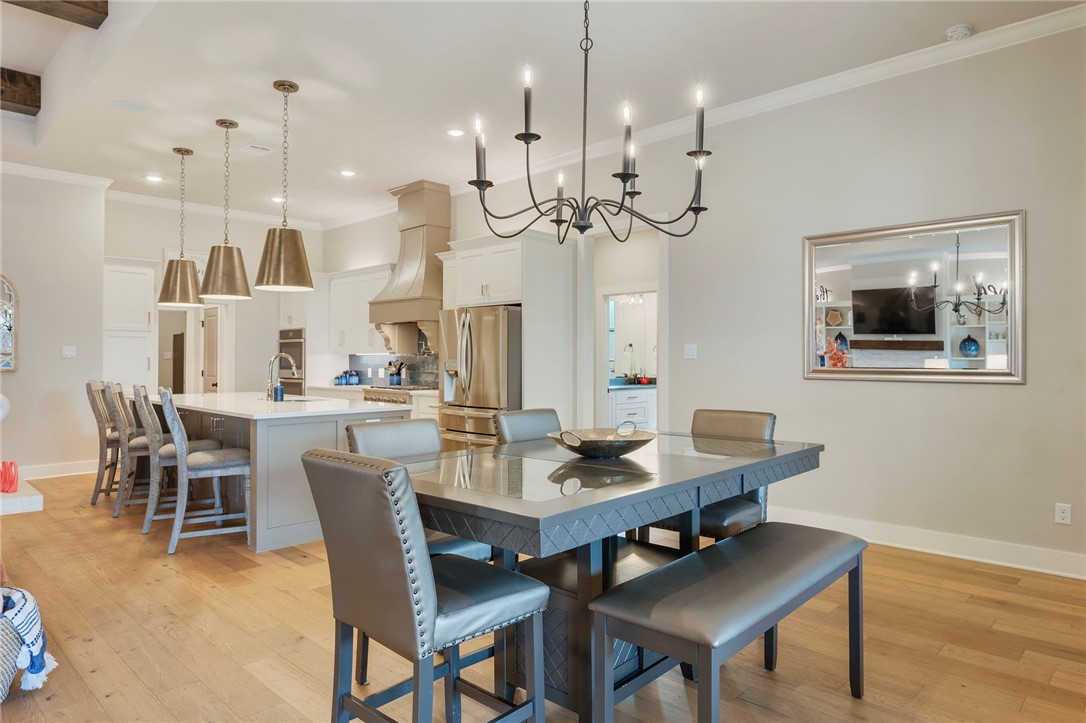 4804 Crystal Ridge Court College Station, TX 77845 - Photo 13 of 48 a view of a dining room with furniture and wooden floor