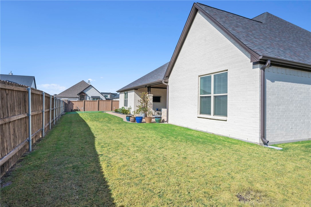 4804 Crystal Ridge Court College Station, TX 77845 - Photo 43 of 48 a view of a house with backyard and garden