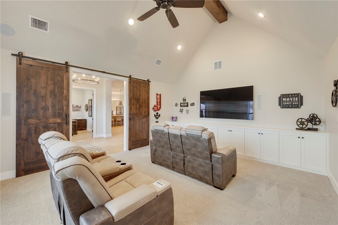 4804 Crystal Ridge Court College Station, TX 77845 - Photo 6 of 48 a living room with furniture and a flat screen tv