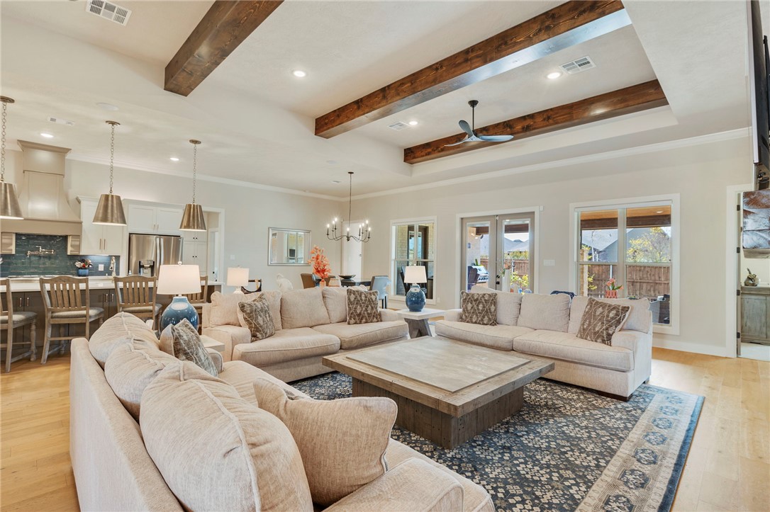 4804 Crystal Ridge Court College Station, TX 77845 - Photo 9 of 48 a living room with furniture and a rug