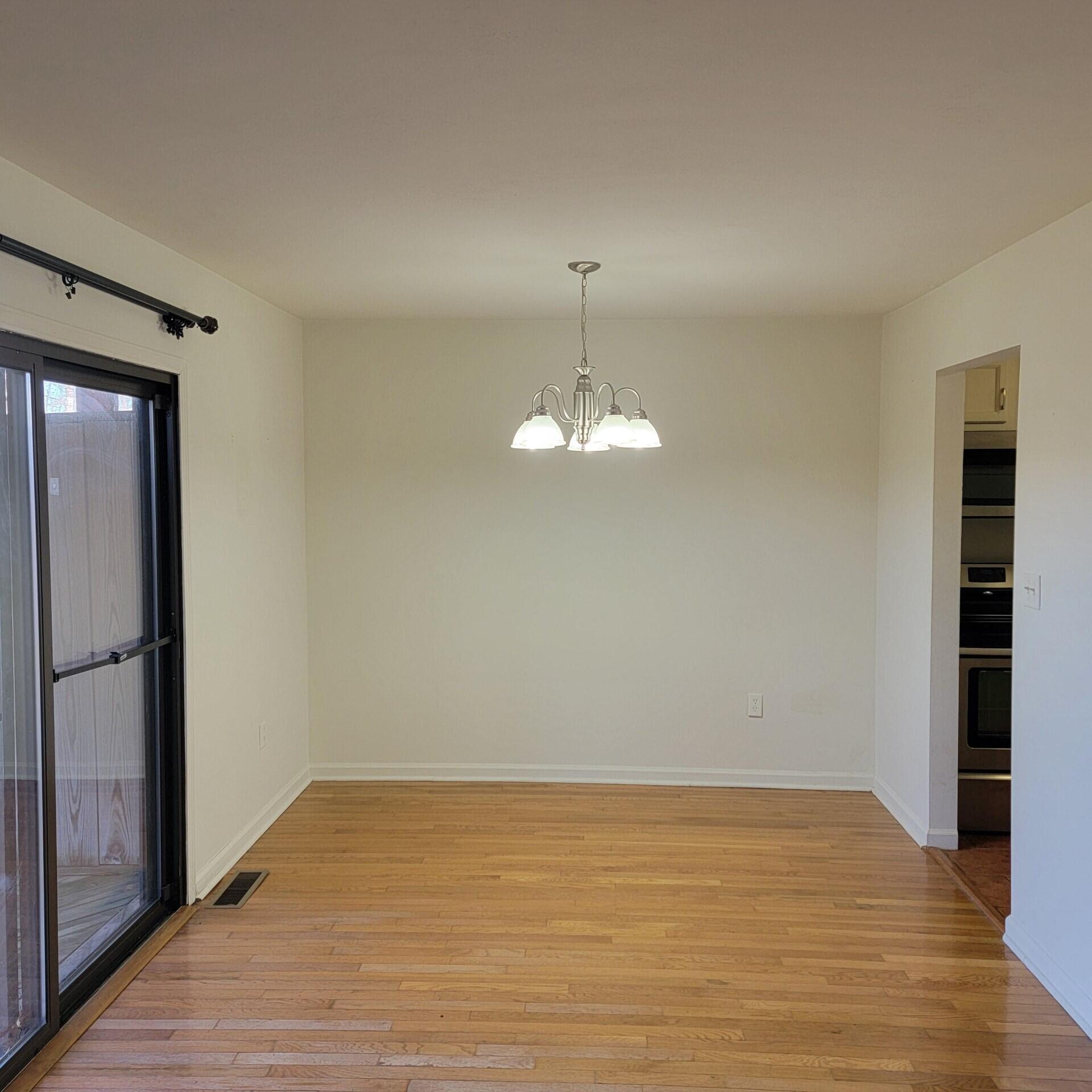 3333 Forest Ridge Road Roanoke, VA 24018 - Photo 3 of 12 a view of empty room with wooden floor