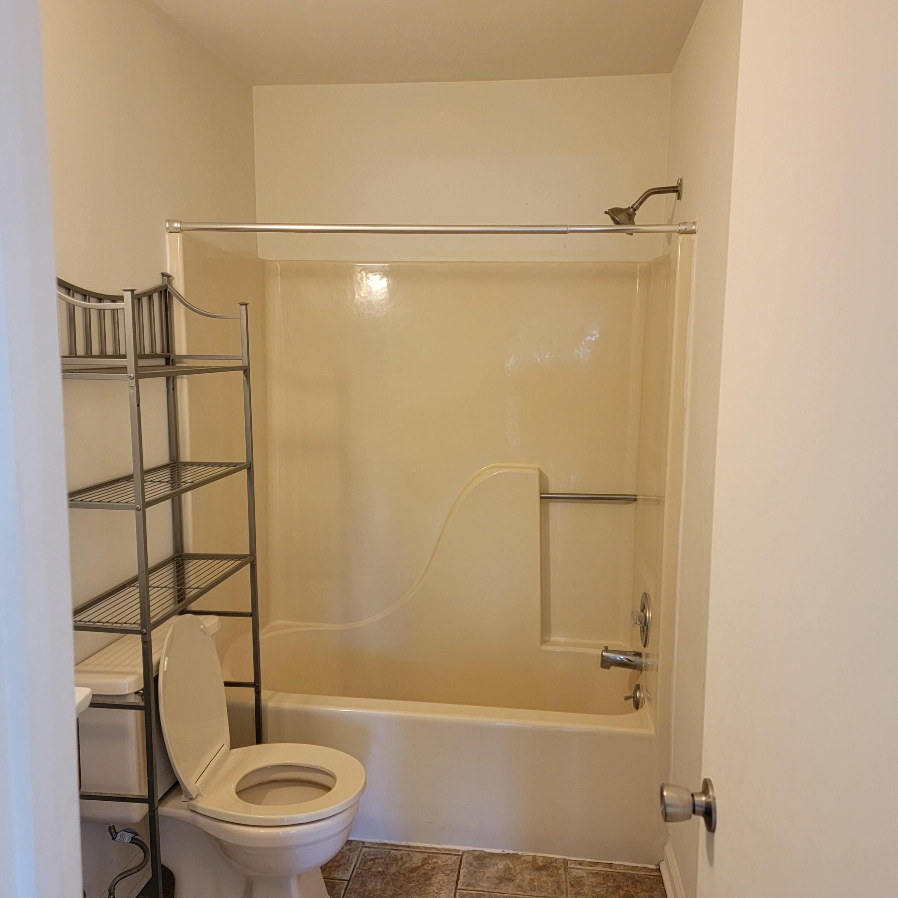 3333 Forest Ridge Road Roanoke, VA 24018 - Photo 7 of 12 a bathroom with a toilet and a shower