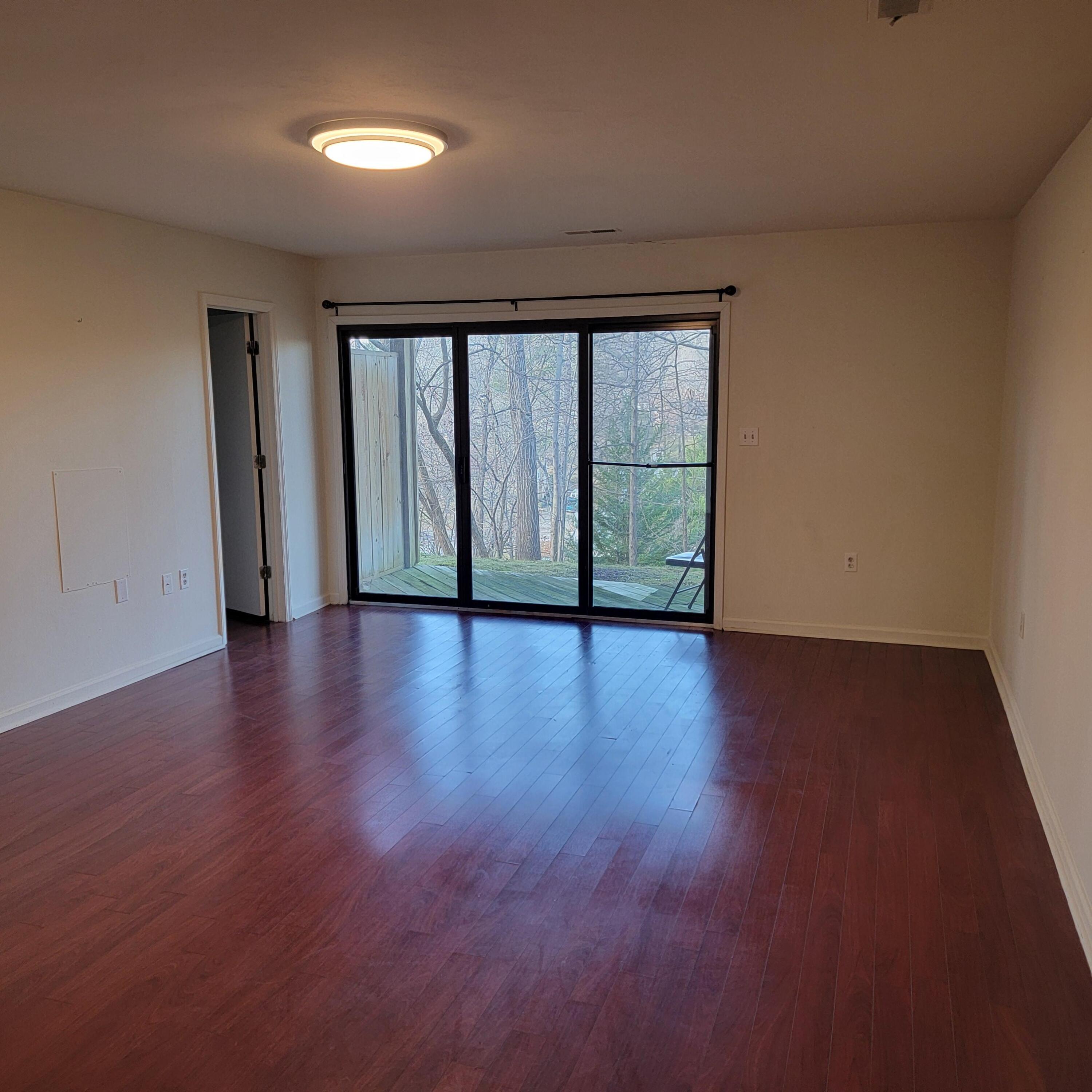 3333 Forest Ridge Road Roanoke, VA 24018 - Photo 8 of 12 a view of room with hardwood floor and large window