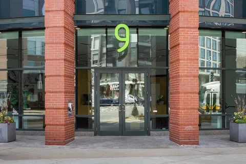 a front view of a building with a glass door