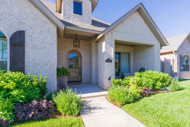 a view of a livingroom with furniture and a window