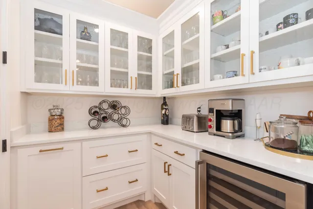 a bedroom with a bed and dresser