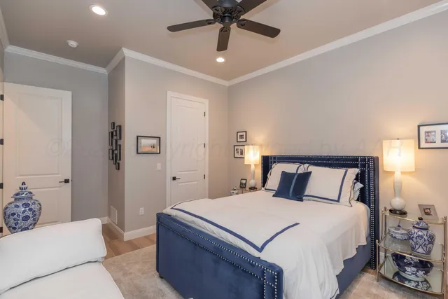 a kitchen with white cabinets a sink and appliances