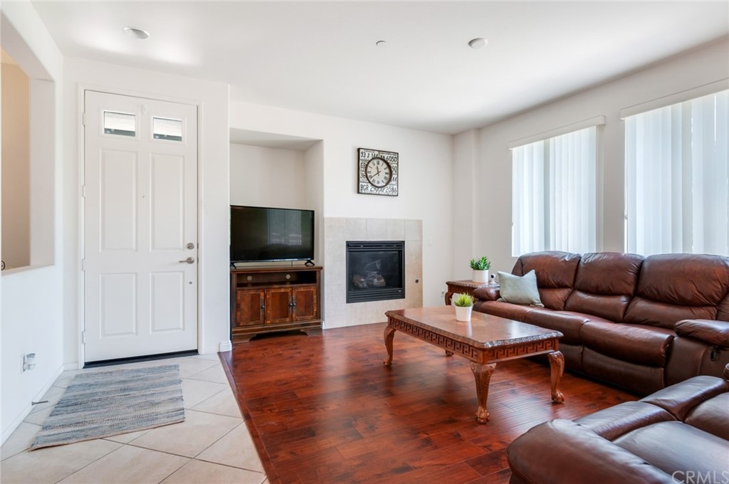 As you enter you see the laminate flooring and how bright the area is.