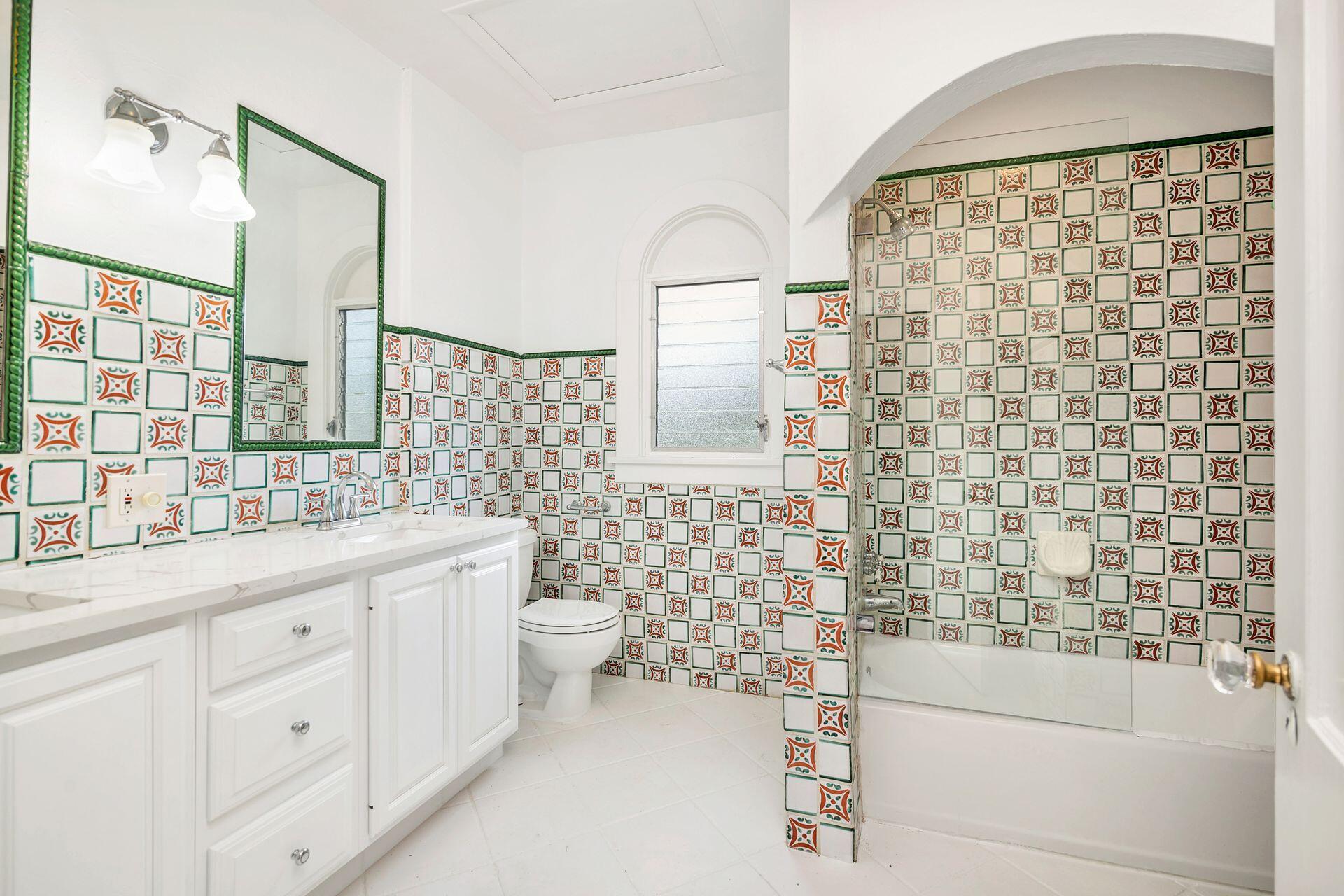 232 Rugby Road West Palm Beach, FL 33405 - Photo 17 of 40 a bathroom with a sink a toilet and shower