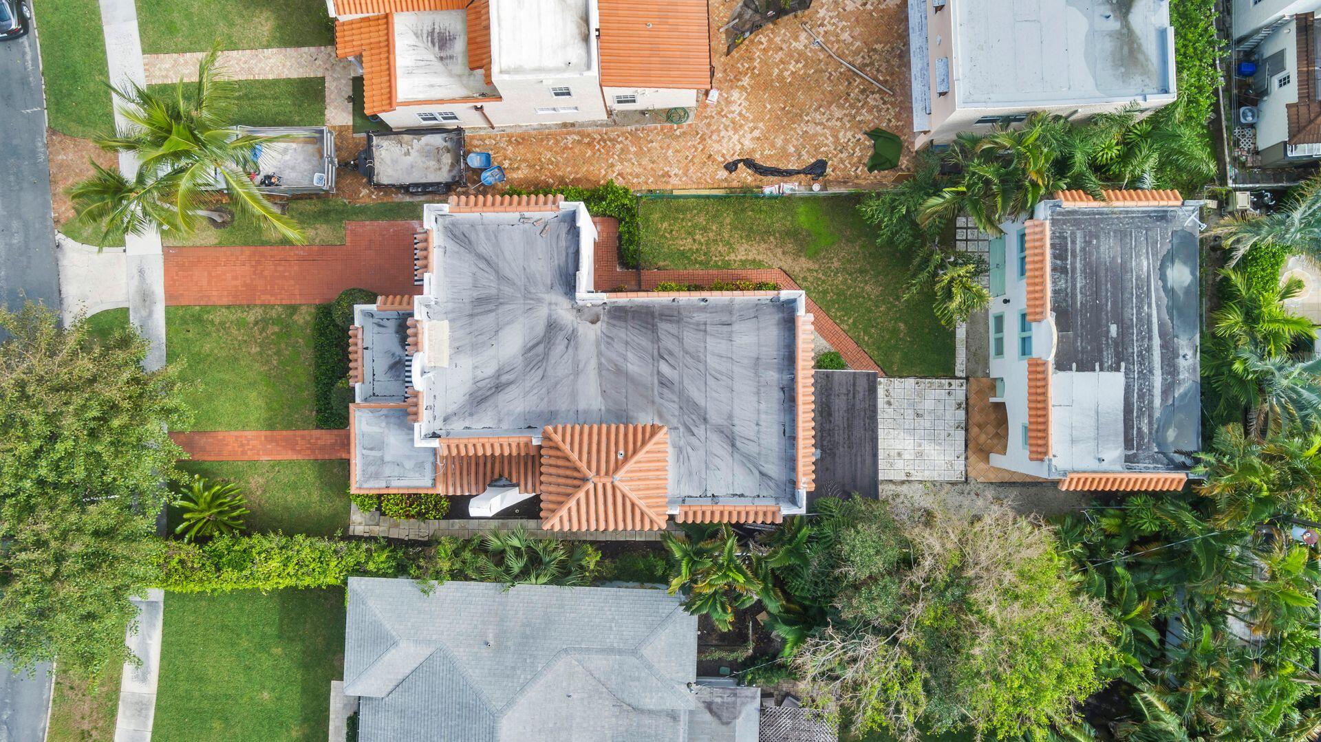 232 Rugby Road West Palm Beach, FL 33405 - Photo 37 of 40 an aerial view of residential houses with outdoor space and swimming pool