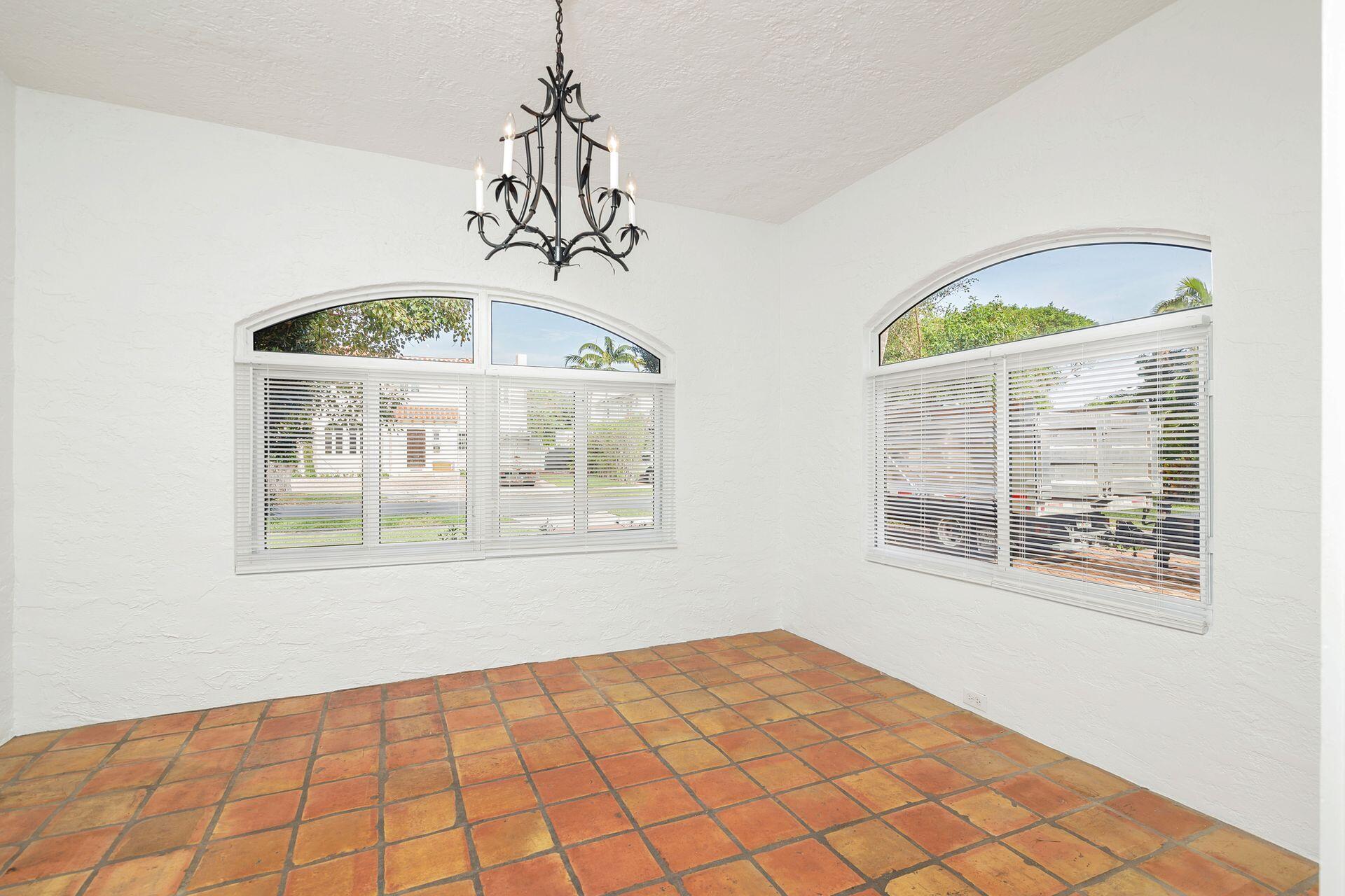 232 Rugby Road West Palm Beach, FL 33405 - Photo 10 of 40 a view of an empty room with a window