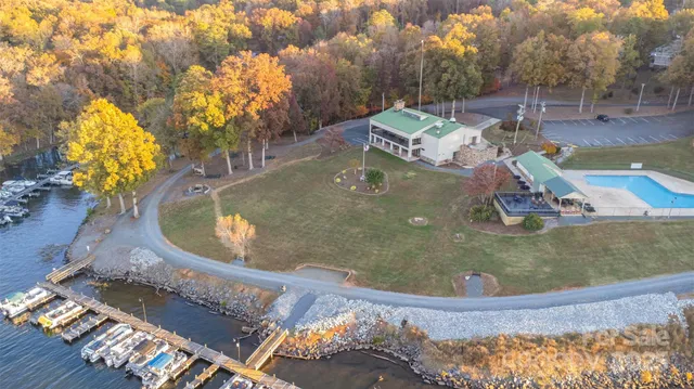 a view of a swimming pool with sitting area