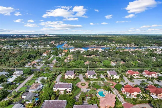 an aerial view of residential houses with outdoor space