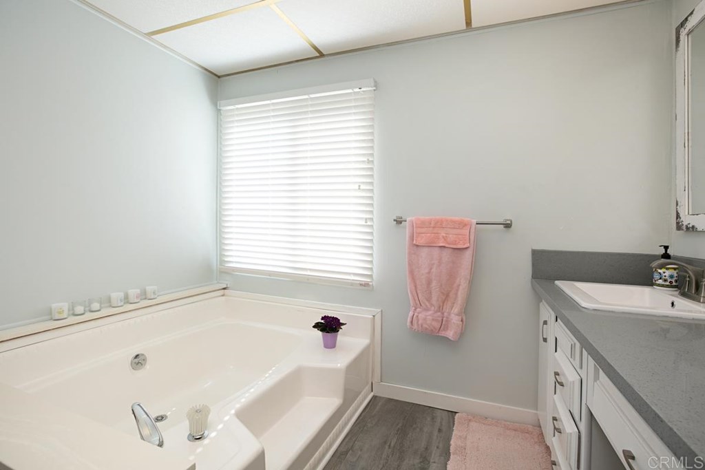 2250 North Broadway, Unit 10 Escondido, CA 92026 - Photo 16 of 30 The master bath has a sunken tub.