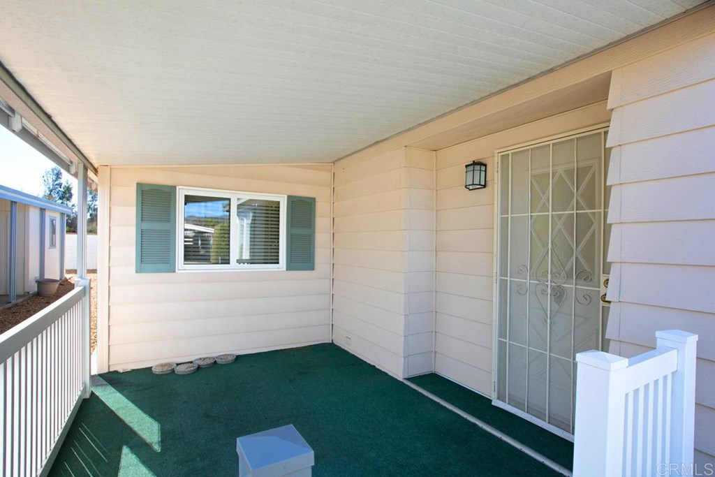 2250 North Broadway, Unit 10 Escondido, CA 92026 - Photo 3 of 30 Shady front covered patio. There is only one step up into the home.