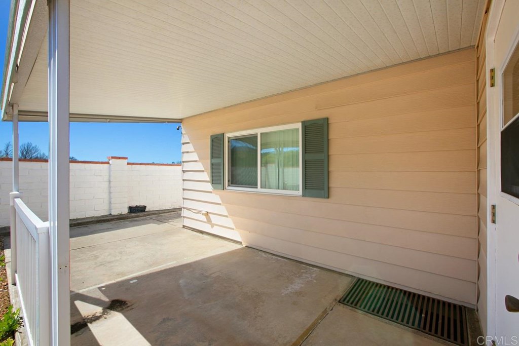 2250 North Broadway, Unit 10 Escondido, CA 92026 - Photo 21 of 30 This shows the backyard covered patio.