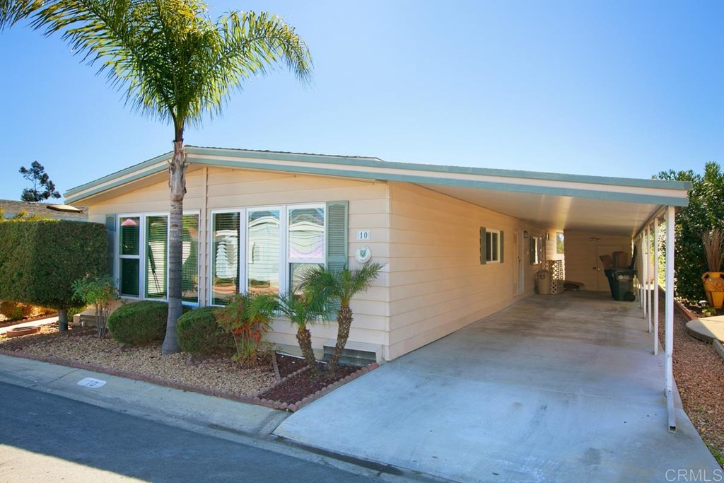 2250 North Broadway, Unit 10 Escondido, CA 92026 - Photo 4 of 30 The covered carport will fit 2 cars. There is also a built-in shed.