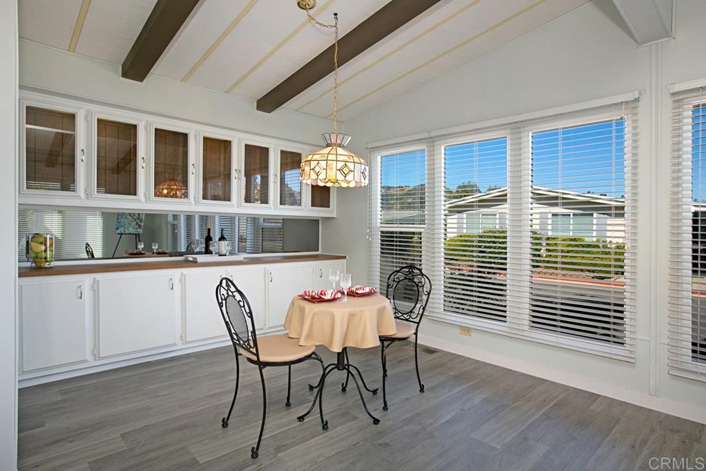 2250 North Broadway, Unit 10 Escondido, CA 92026 - Photo 6 of 30 The dining room has built-in cabinets with upper glass displays.